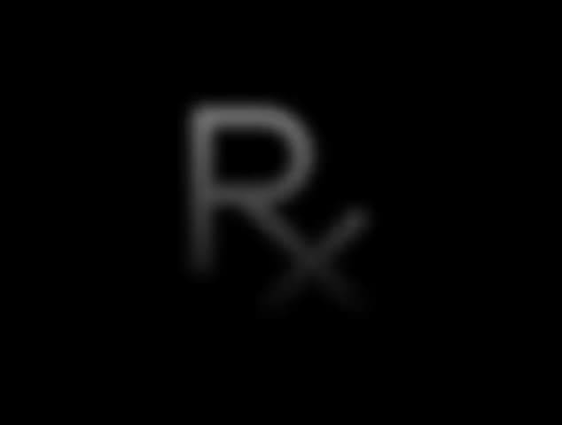 Glowing Rx prescription symbol on a dark background